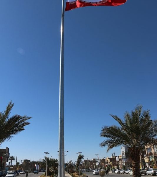 برافراشته شدن پرچم مقدس جمهوری اسلامی ایران در مرکز شهر بافق