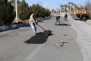 روایت تلاش : گزارش تصویری از لکه گیری آسفالت معابر سطح شهر ( بلوار شهدا )