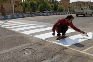 روایت تلاش : گزارش تصویری از رنگ آمیزی ترافیکی معابر سطح شهر